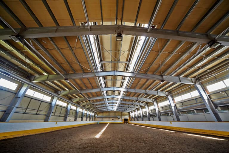 what-is-the-right-riding-arena-size-for-competitive-equestrians